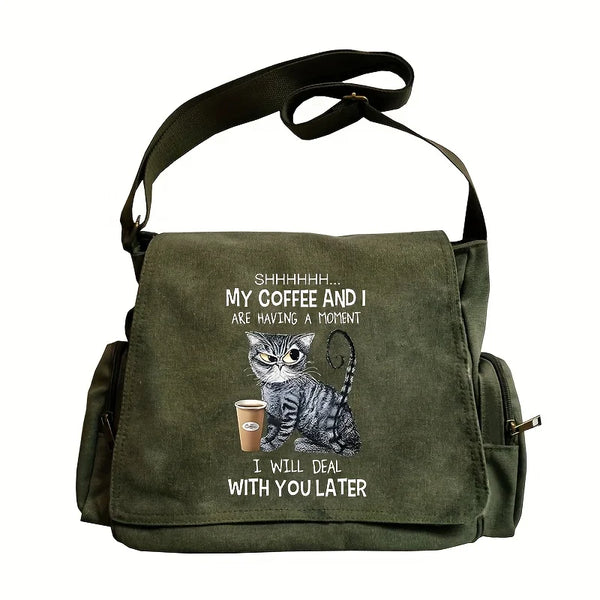 Olive green canvas messenger bag featuring a black and white striped cat print.