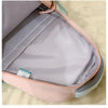 A pink and gray fabric backpack is shown open, displaying the interior lining.