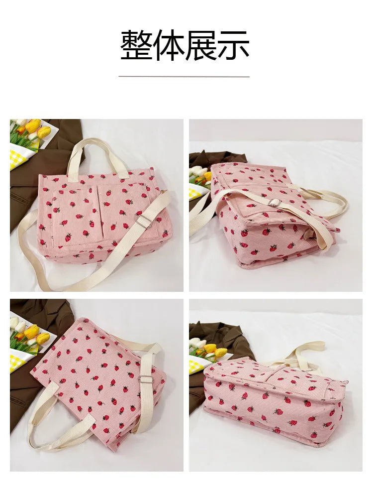 Four views of a pink canvas tote bag featuring a red strawberry pattern.
