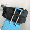 A black waterproof travel gym backpack with light blue skateboard straps resting on a light blue box.