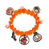 Orange pumpkin ghost charm bracelet with a black skull charm and a Halloween themed pendant