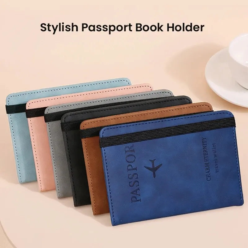 A collection of stylish passport book holders in various colors, including blue and pink, displayed on a light background.