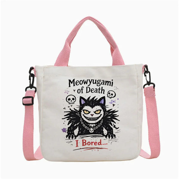 White canvas tote bag featuring a black cat face design with text that reads I Bored