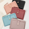 A collection of five ultra-thin PU leather card holder wallets in shades of pink, mauve, and black.