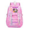 Pink Huntrix laptop backpack featuring a graphic of three female characters and purple accents
