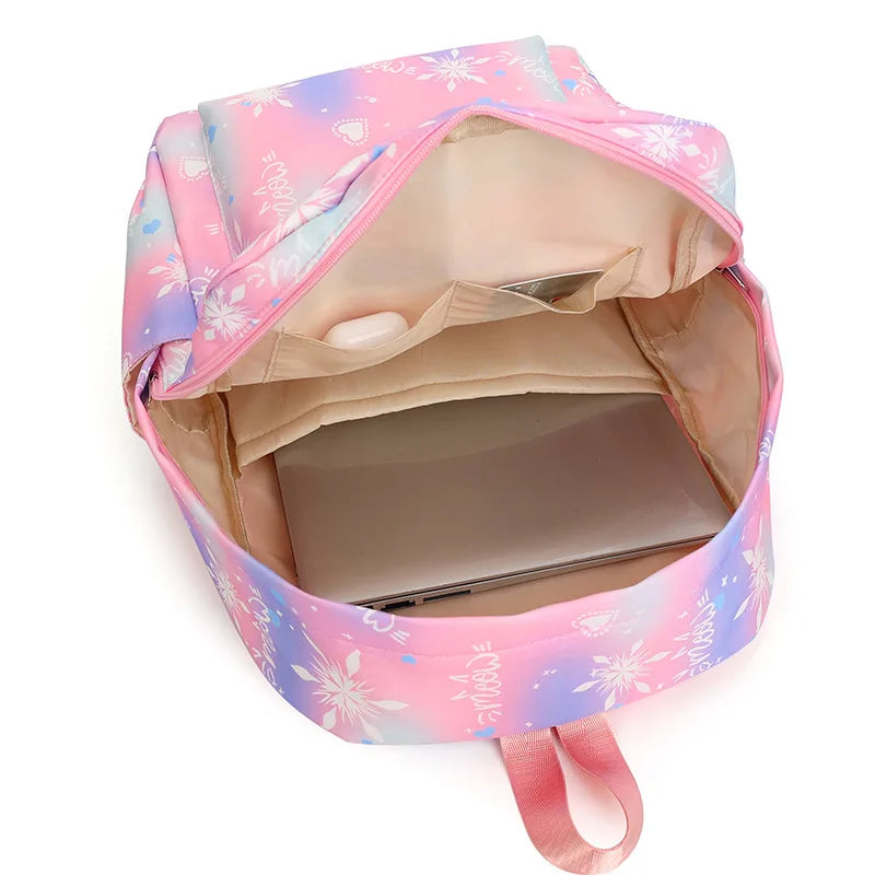 A pink and purple multi-compartment backpack set with a light beige interior and a pink strap.
