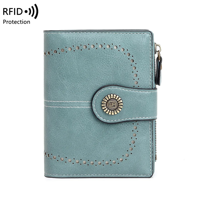 A teal leather wallet with perforated edges and a central card holder, featuring RFID protection.