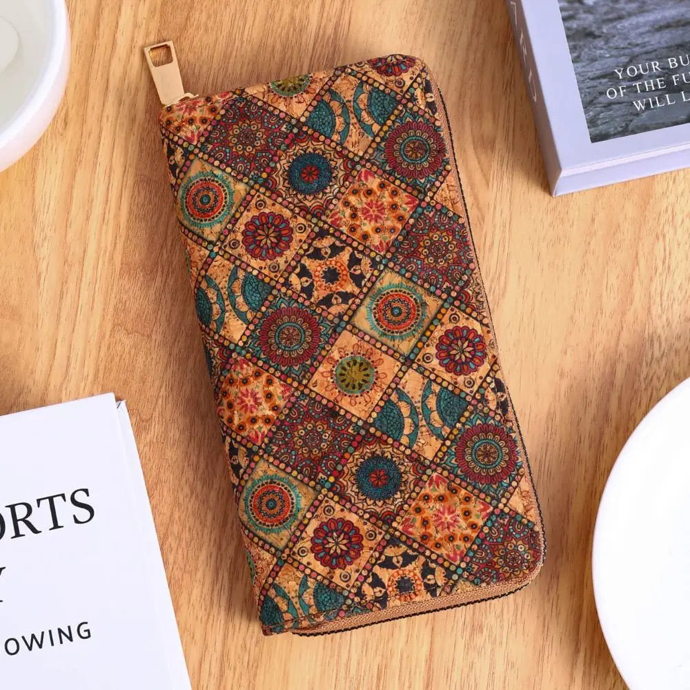 A patterned bohemian wood-grain leather wallet with multiple card slots resting on a wooden surface.