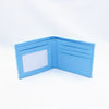 A light blue fabric wallet with a clear window and embroidered details shown open.