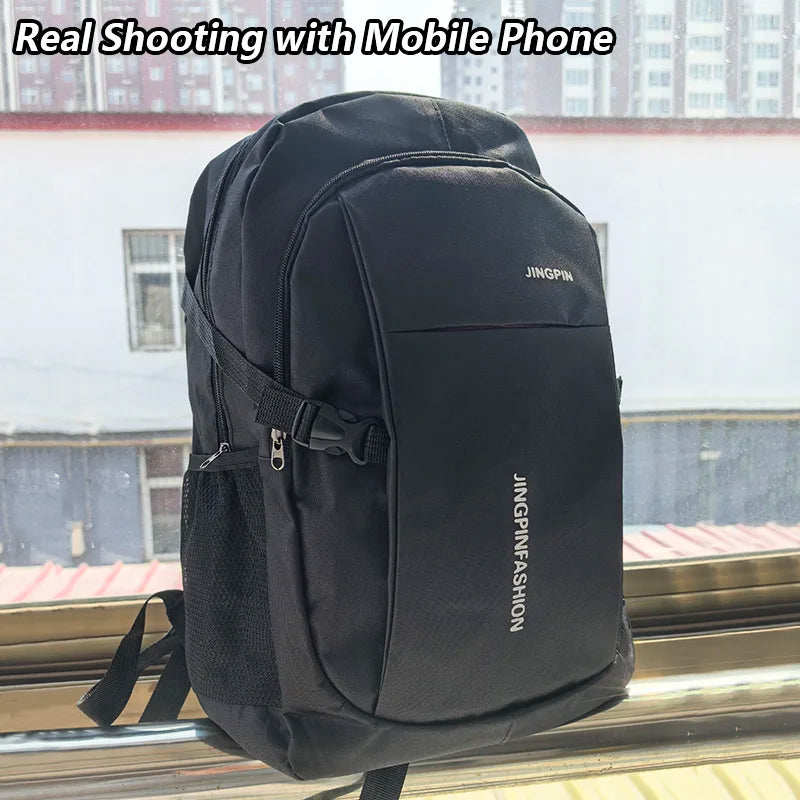 A black Jingpin backpack is shown in a close-up, ready for real shooting with a mobile phone.