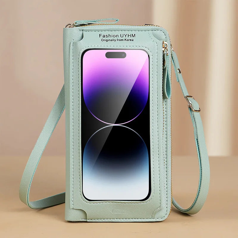 Hellmintgrüne multifunktionale Crossbody-Handytasche mit klarem Display, Riemen und Reißverschluss.