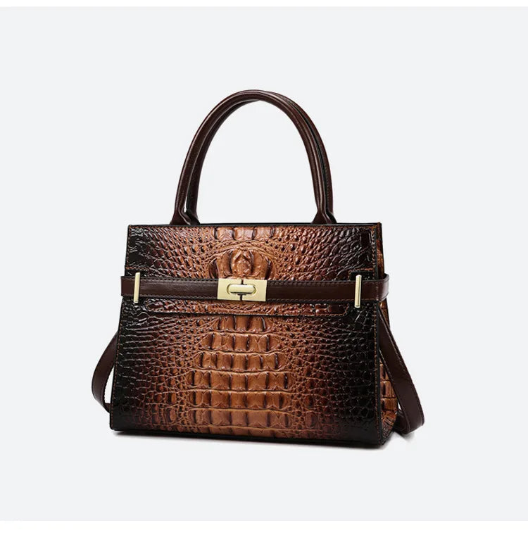 A brown crocodile embossed PU leather shoulder handbag with a gold-toned buckle and strap.