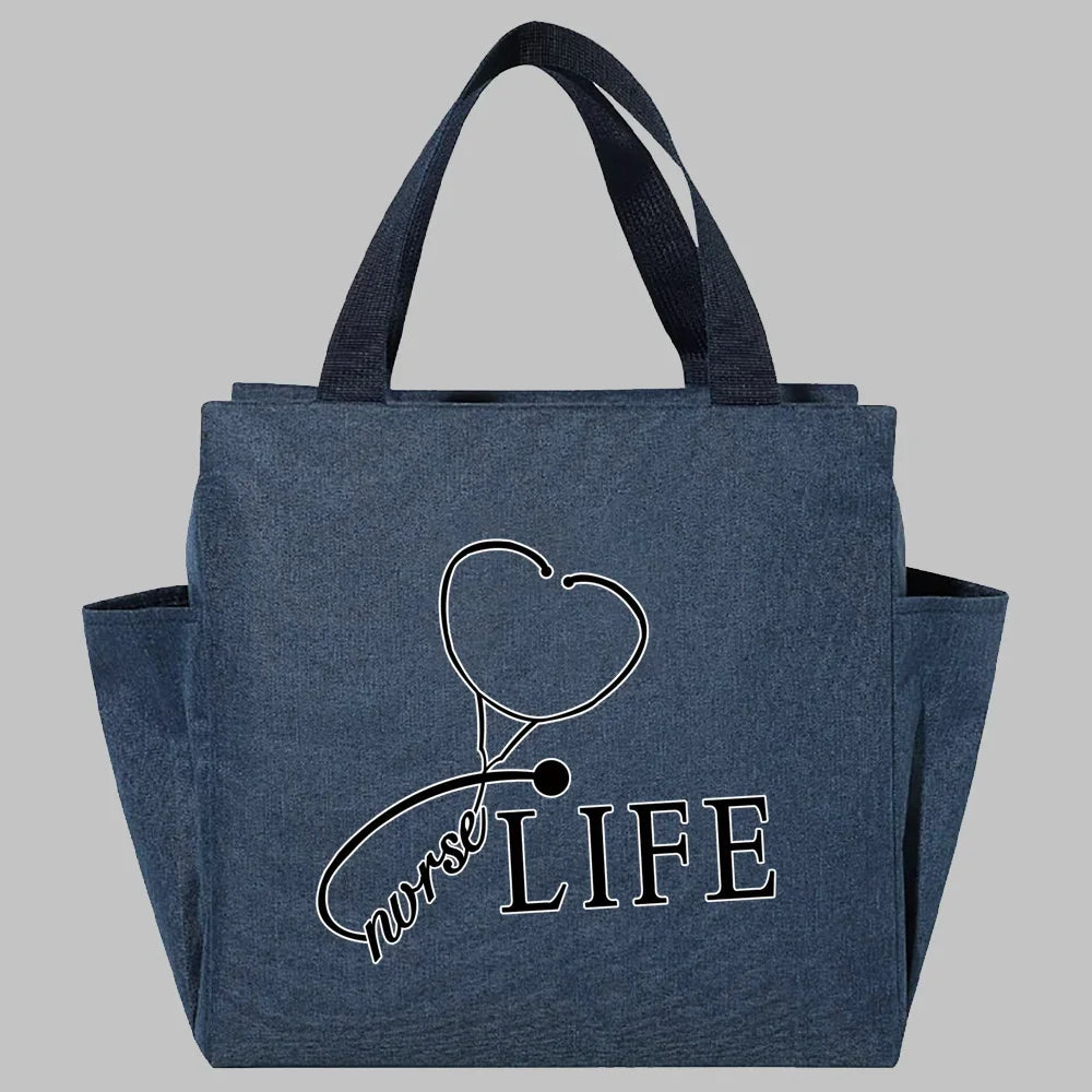 Bolsa de almuerzo de lona azul marino con un dibujo de estetoscopio y la frase NURSE LIFE