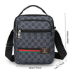 A black patterned sling bag with a black strap and a brown leather accent.