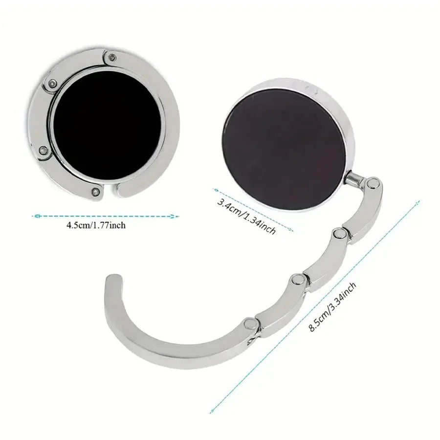 Silver marble pattern portable bag hook and organizer with a circular clip and curved hook.