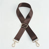 A dark brown nylon adjustable shoulder strap with gold-toned hardware.