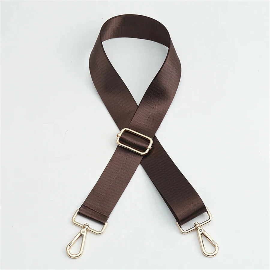 A dark brown nylon adjustable shoulder strap with gold-toned hardware.