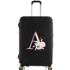 Black luggage protector cover with a large pink floral letter A design.