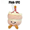 Pink bread plush keychain with a striped straw and a smiling face