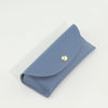 A light blue PU leather hard shell sunglasses case with a gold-colored snap closure.