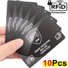 A hand holds a stack of ten black RFID protection cards, demonstrating the RFID protection feature.