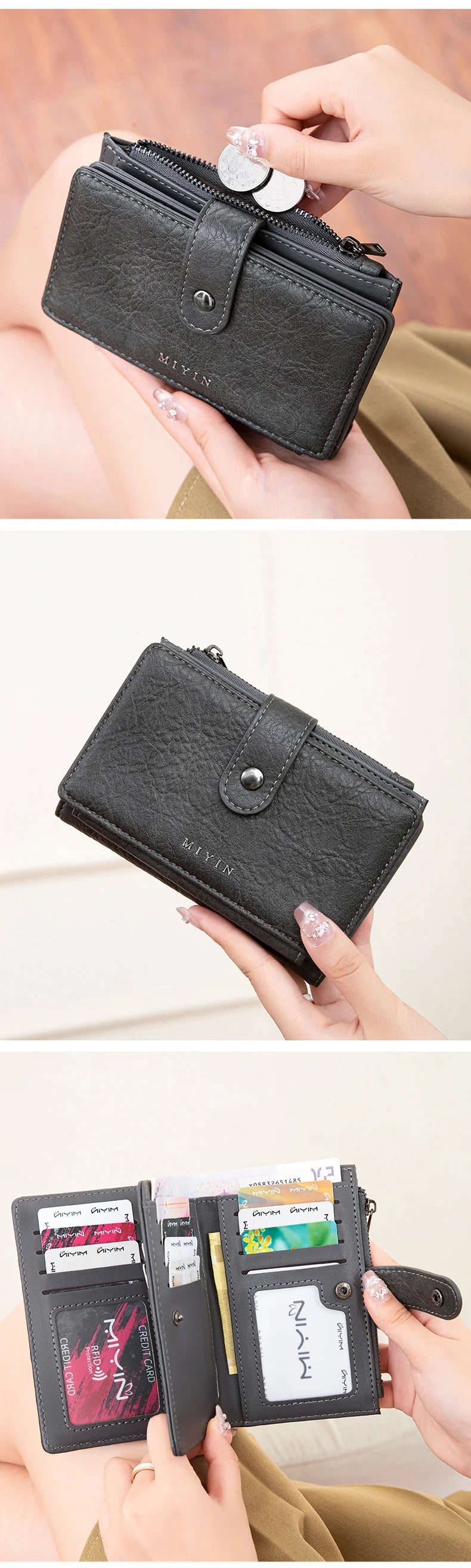 A black leather clutch wallet with silver accents is held by a hand, showing the interior card slots.
