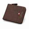 A brown leather men's wallet with a stitched edge and a small red and white flag detail.