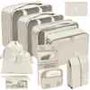 A set of beige fabric storage organizers and pouches for organizing various items.