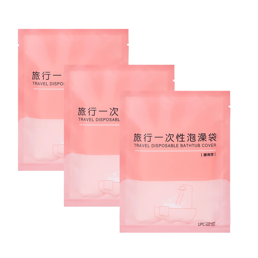 Three pink sachets of disposable bathtub covers for travel