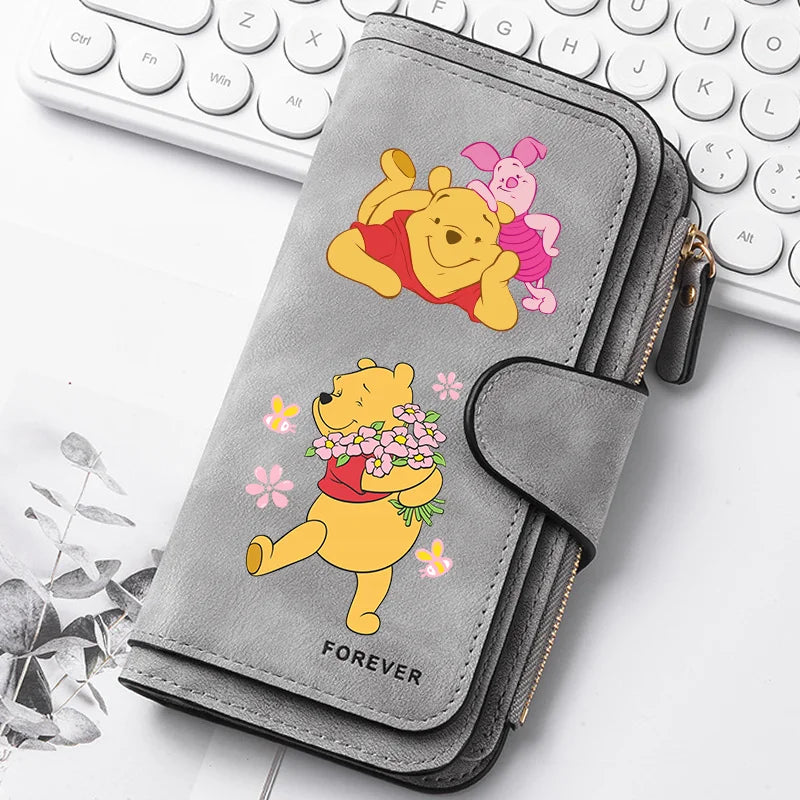 A gray women's long zipper handbag coin purse featuring cute yellow and pink bear illustrations.