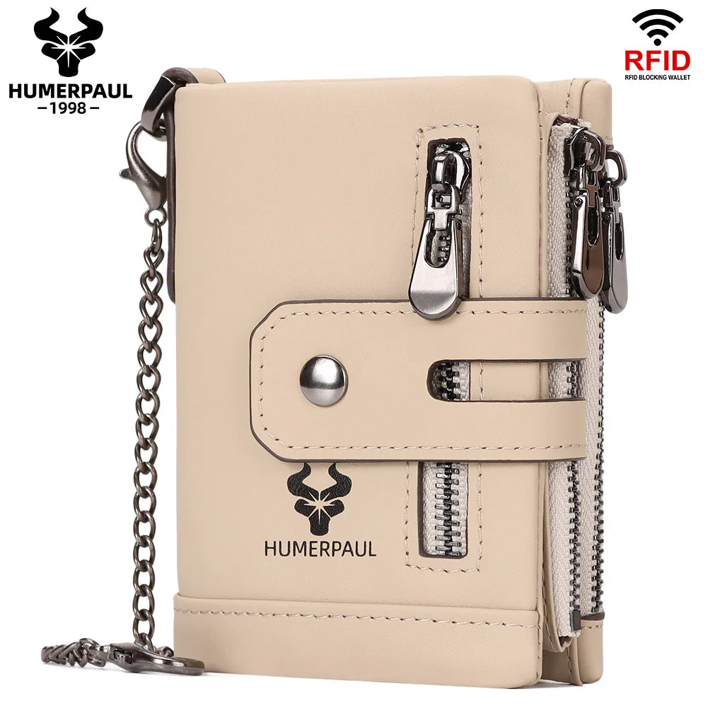 A beige leather bifold wallet with a silver clasp and zipper details, featuring an embossed panther logo.