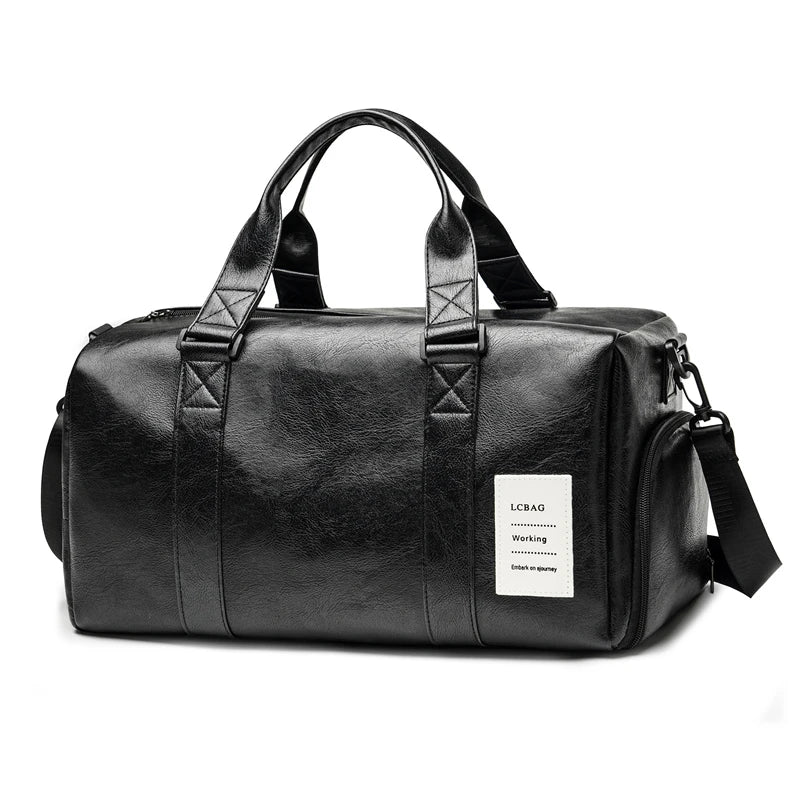 Black leather duffle bag with padded straps and a small white label on the front