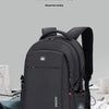 Sac à dos d'ordinateur portable noir suisse anti-vol sur fond gris clair.