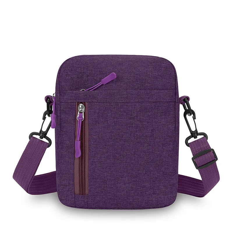 A purple lightweight nylon crossbody shoulder bag with a zipper closure and adjustable strap.