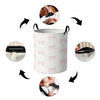 A pink foldable storage basket shown with various angles demonstrating its features and folding mechanism.