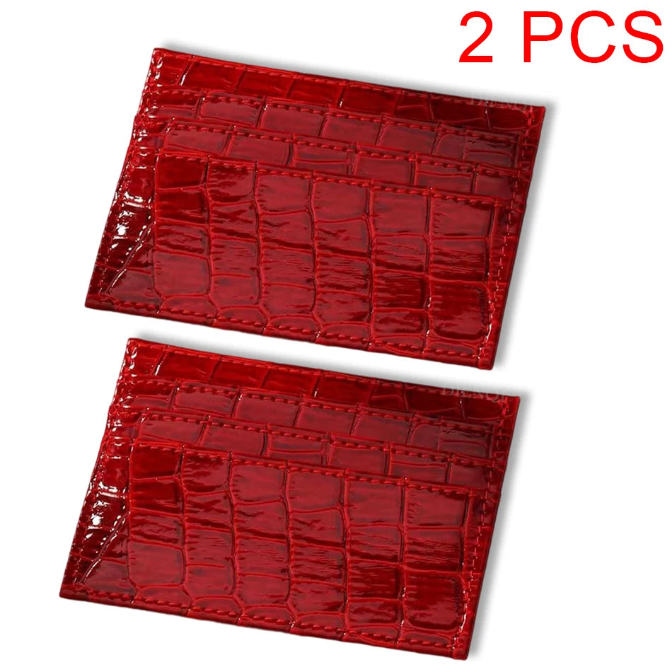 Two red crocodile pattern slim card holder wallets