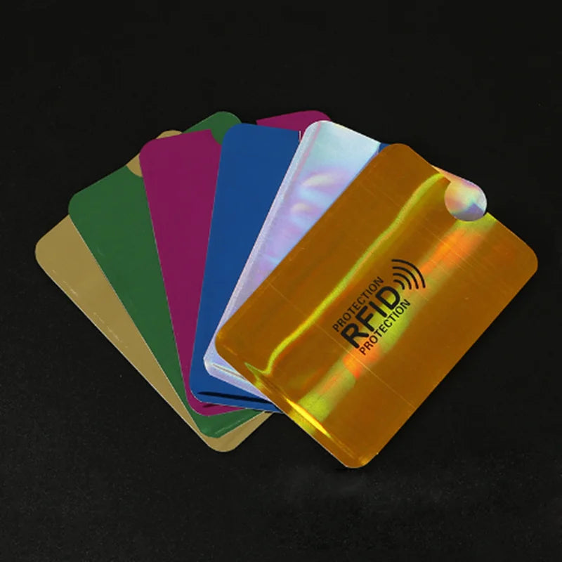 A stack of ten anti-RFID blocking cards in various colors, including green, purple, blue, and orange.