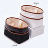 White and black tote bag organizer inserts shown stacked, highlighting the color options.