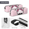 Pink pencil case with a skull design featuring a pink bow and black details, showing hardware and zipper.