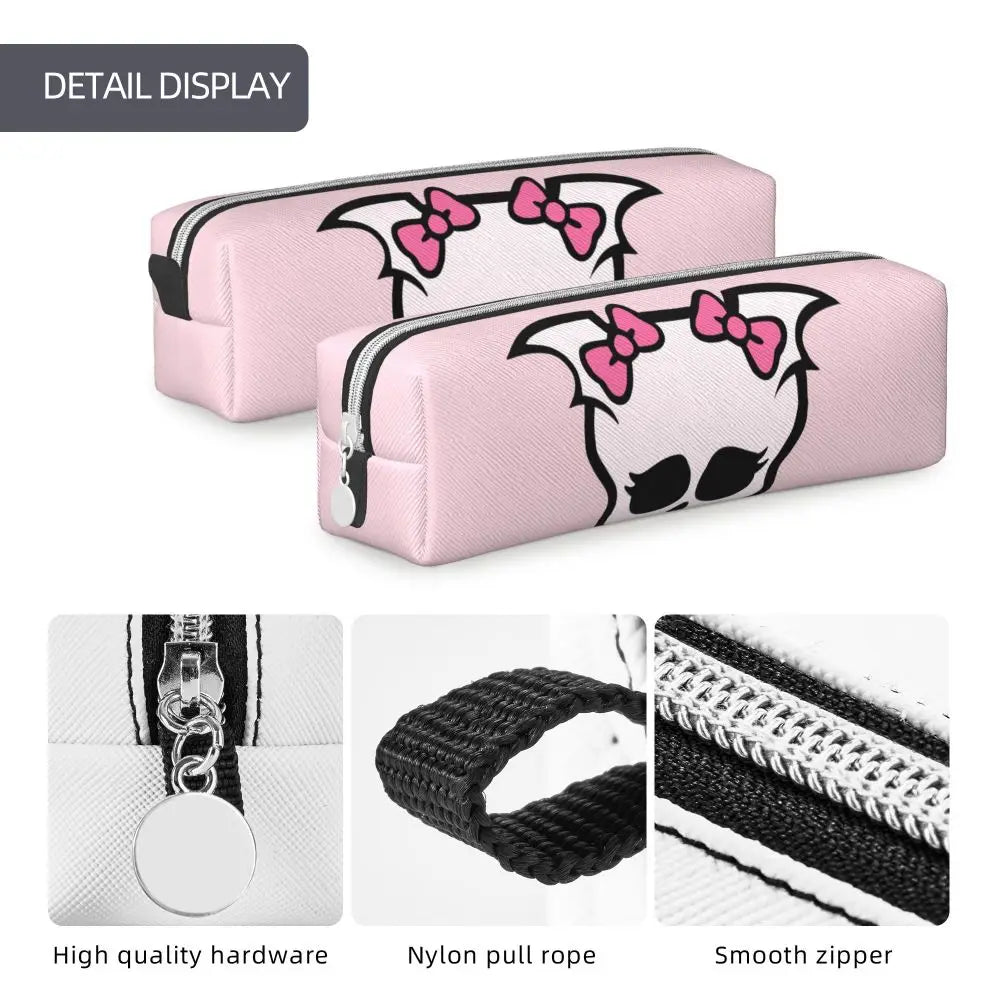 Pink pencil case with a skull design featuring a pink bow and black details, showing hardware and zipper.