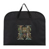 Black fabric dust cover and storage bag with an ornate gold letter H design
