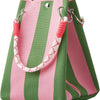 A striped knit bucket tote bag in pink and olive green with silver hardware.