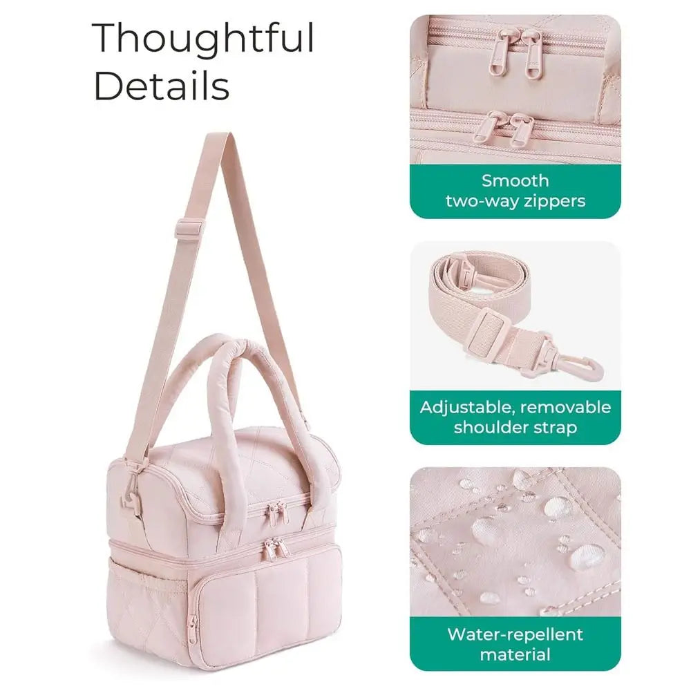 Bolsa térmica impermeable de doble compartimento rosa claro con correa ajustable y cremalleras lisas.