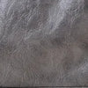 A close-up view of a dark gray soft PU leather shoulder tote bag.