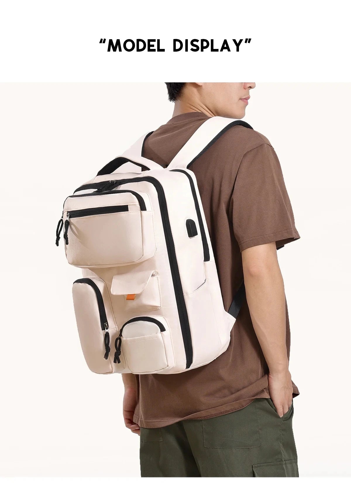 A person is wearing a beige travel backpack with black accents, displayed against a white background.
