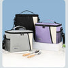 Three insulated reusable lunch bags in black, purple, and gray with white accents are displayed on a white surface.