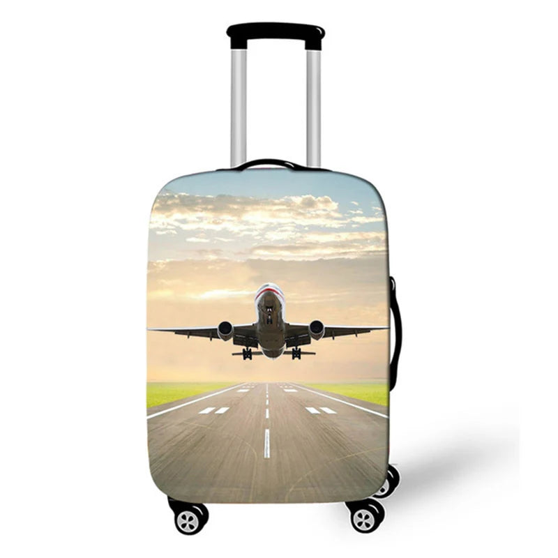 A silver rolling suitcase with a scenic sunset airplane view printed on the cover.