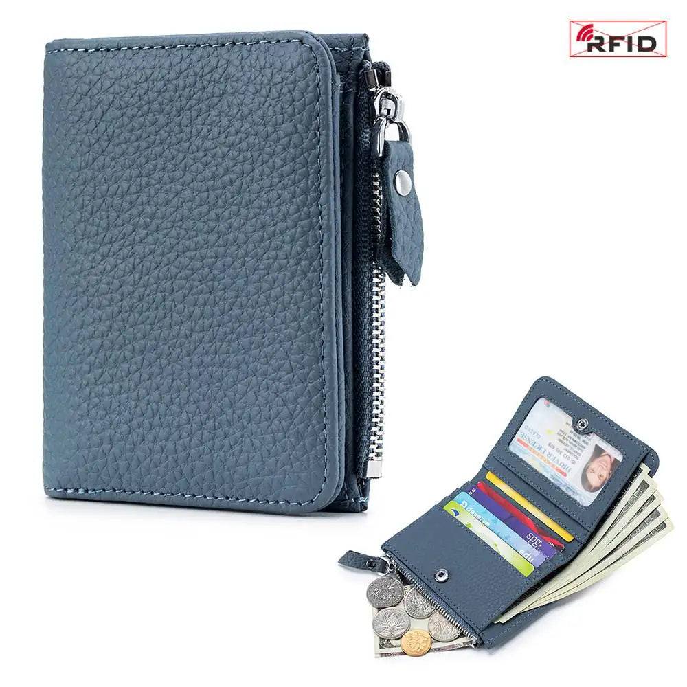 A dark gray genuine leather slim bi-fold wallet with a zipper closure and cash slots.