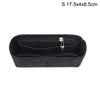 Black felt bag insert organizer with a zipper and a decorative charm