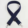 Navy blue adjustable handbag strap with an arrow jacquard pattern